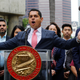 Assembly member Miguel Santiago (D-Los Angeles) at podium with State Sen. Kevin de Leon (D-Los Angeles), right, in Los Angeles Wednesday, Dec. 20, 2017.